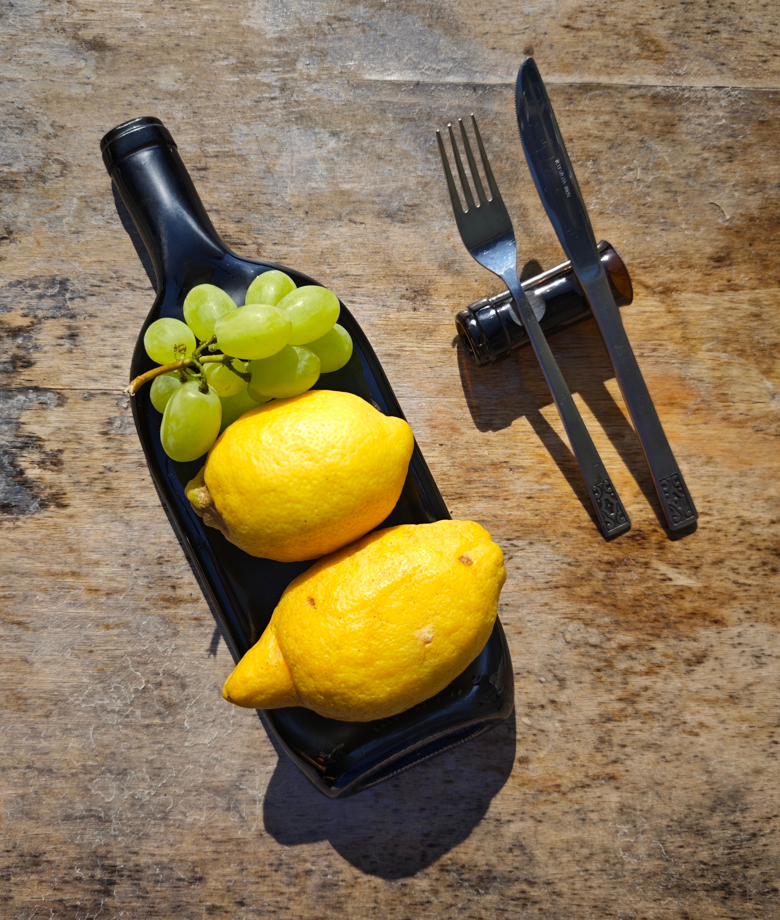 Vassoio | Bottiglia di vino schiacciata