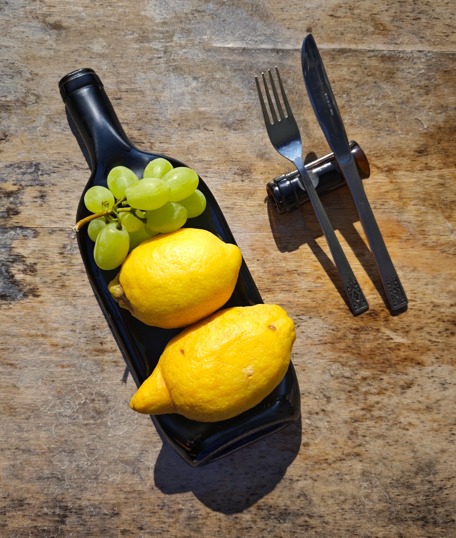 Vassoio | Bottiglia di vino schiacciata