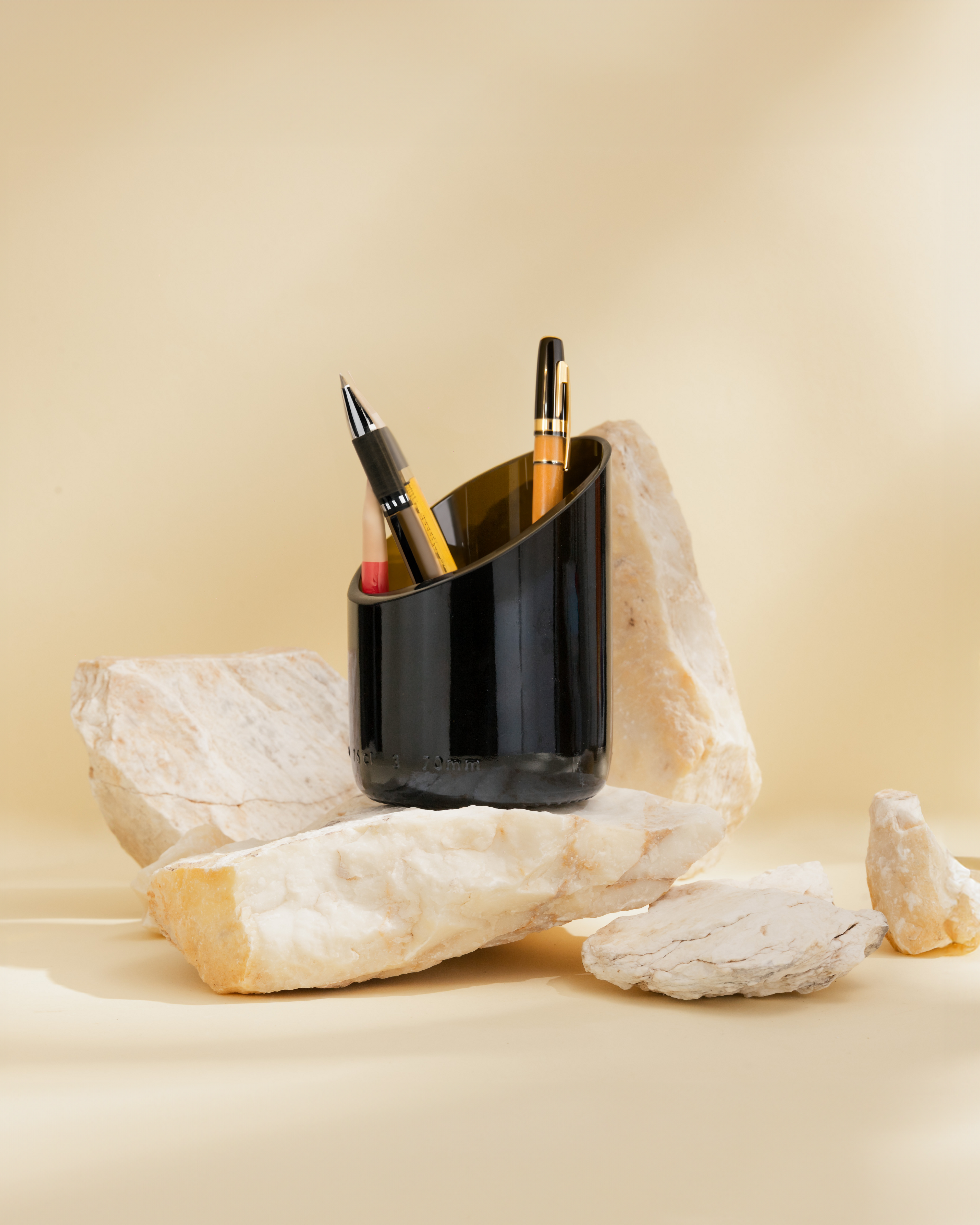 Pen holder made from recycled glass from wine bottle